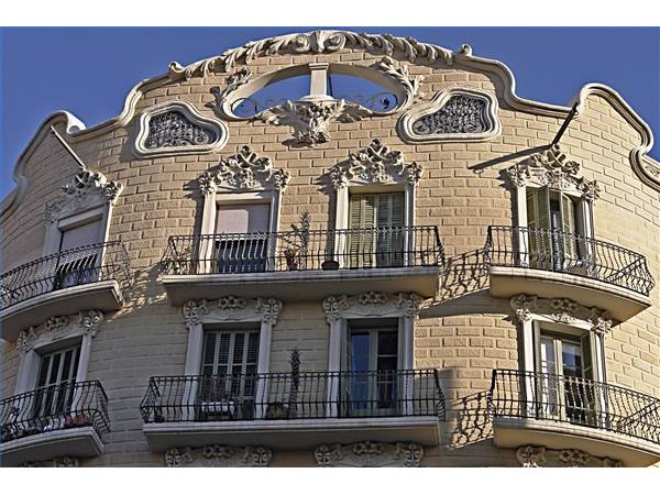 This building features both straight and curving balconies.