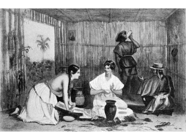 Women grinding chocolate