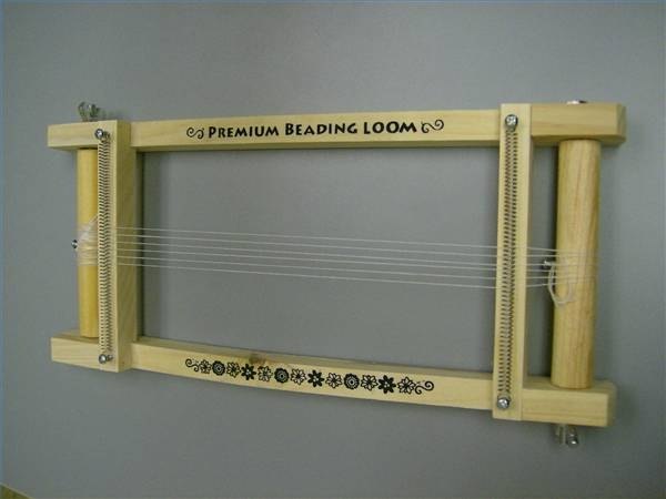 Loom is now warped or threaded and ready for you to bead your project.