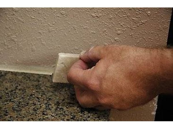 How to Install a Travertine Tile Backsplash (with Pictures) | eHow