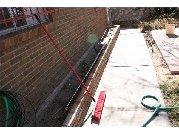 Scrub area thoroughly with washing soda solution.