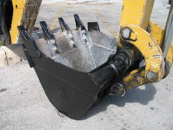 Use bucket on excavator to break the larger pieces of asphalt into smaller ones.