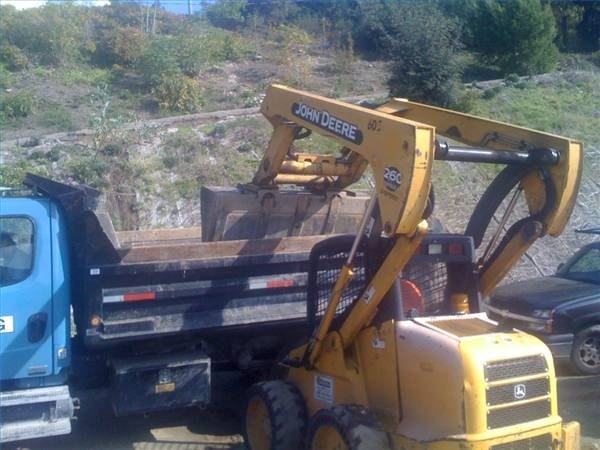 Load up the old asphalt and haul it away.