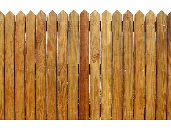 This cedar stockade style fence uses standard grade pickets.