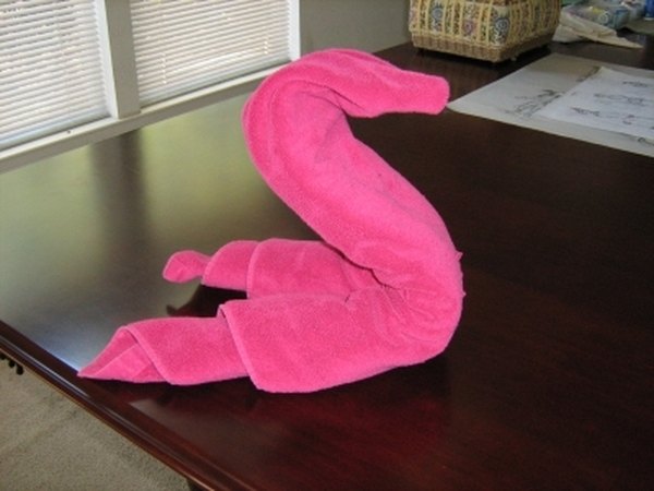 Creating the swan shape.