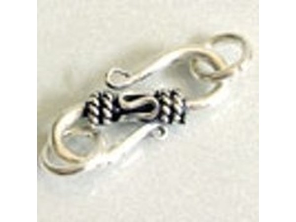 S Clasp secures at either end.