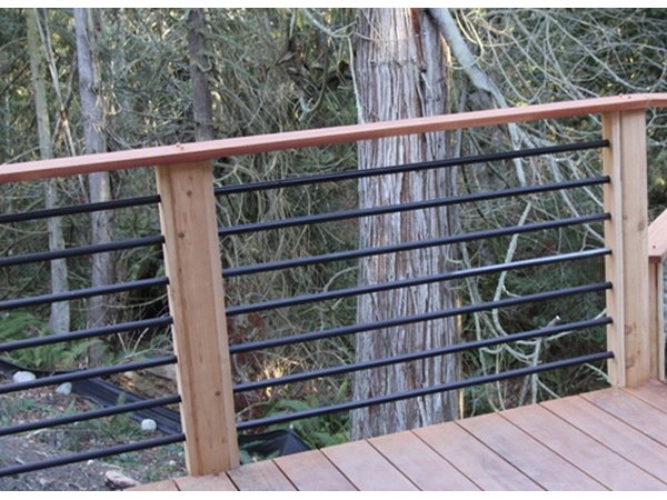 Metal bars fitted into a pre-drilled wood frame