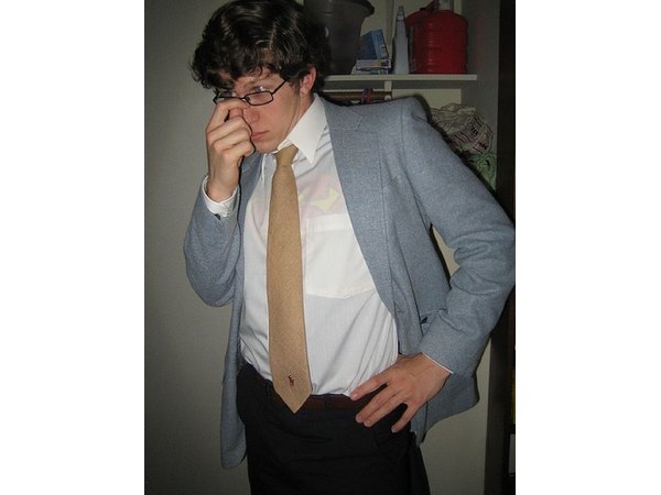 Dressed as Clark Kent with a suit