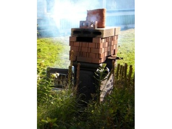 Vent hole at the top/side of the kiln