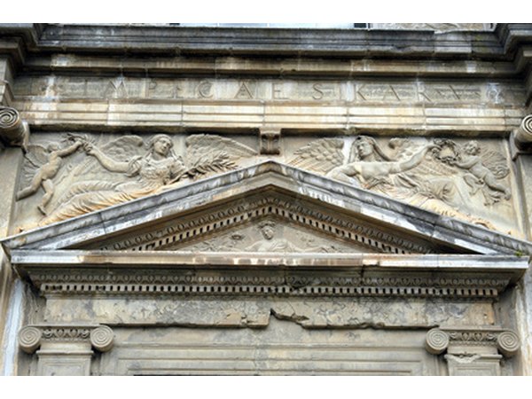 A pediment adorns a building's main entry.