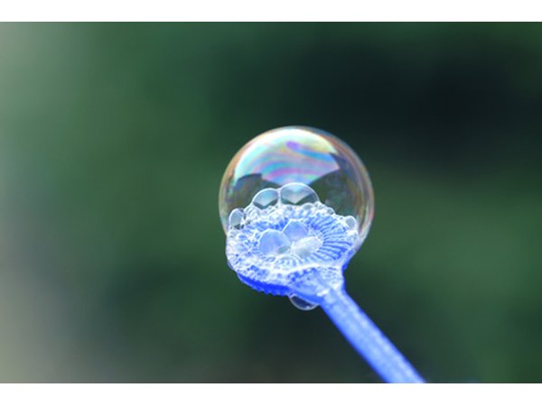 The player who pops the most bubbles before they hit the floor is the winner.