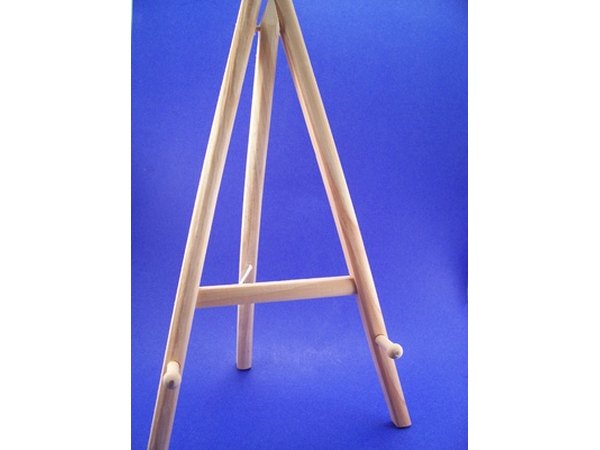 Set up an easel with a piece of poster board or blank canvas at the entrance for guests to sign.
