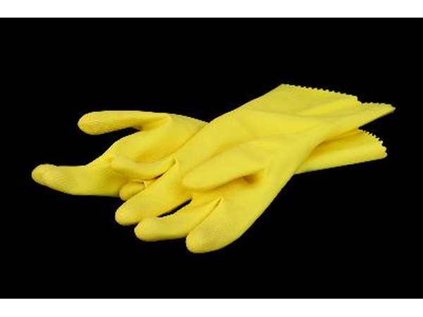 Household gloves can protect the hands from exposure when spraying.