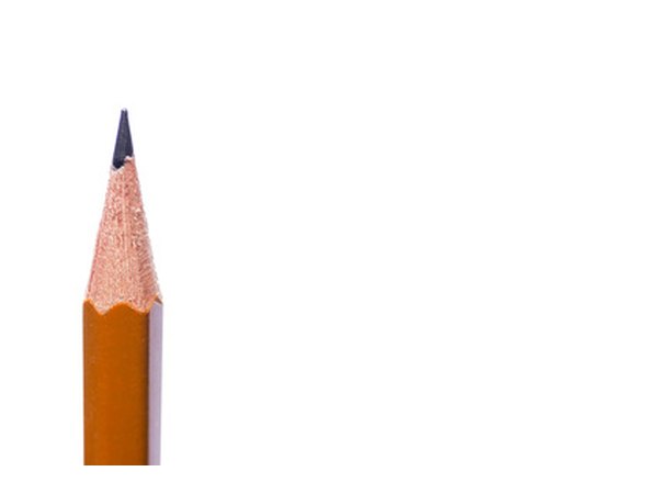 The tooth design is drawn with pencil onto each piece of poster board.
