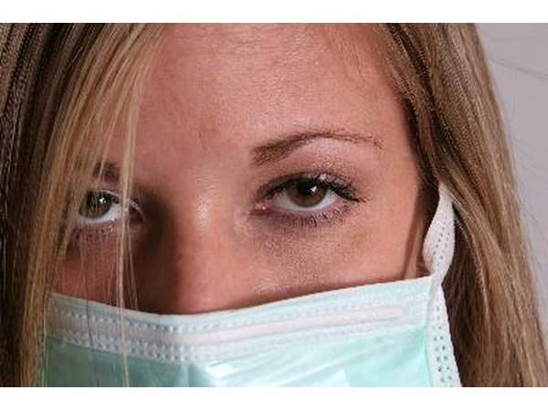 An inexpensive medical mask can protect pesticide users from breathing in fumes.