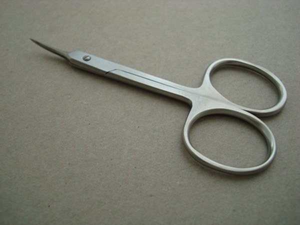 Cosmetic scissors with blades under four inches are allowed.