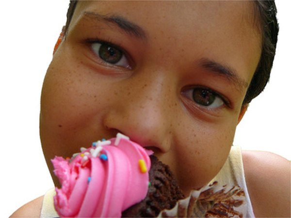 Kids and teachers alike love eating cupcakes.