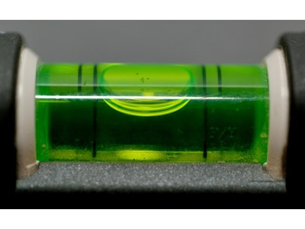 Use a spirit level to ensure the area is even.