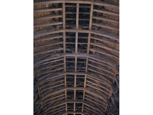 Wood, tin and other metals are viable options for pole barns.