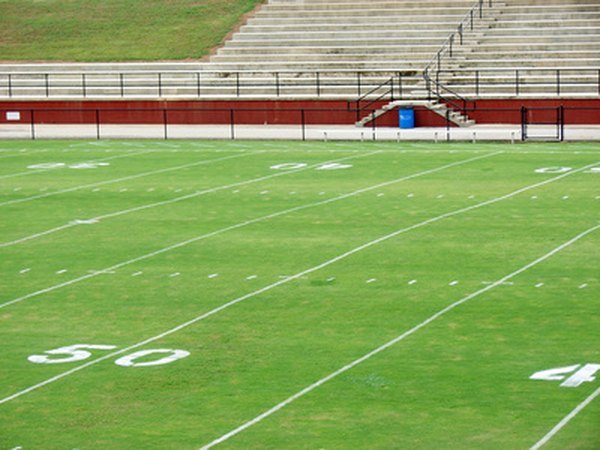 Decorate the poster to look like a football field.