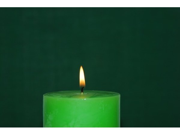 Instead of a plain candle, create one covered in shells.