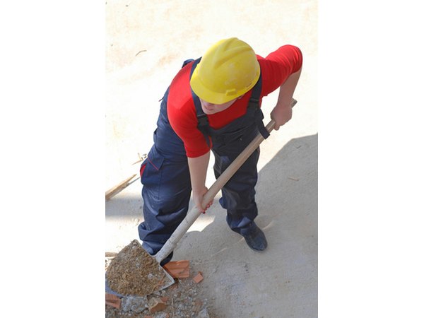 Use a spade to excavate for the foundation.