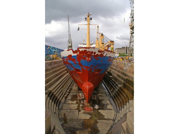 Some marine engineers oversee work carried out on docked ships.