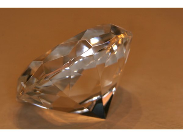 Evaluate diamond quality through gemological testing.
