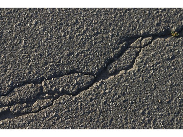 Worn, slightly cracked asphalt can be repaired with an asphalt resurfacer.