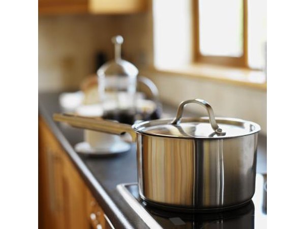Covered pot on oven