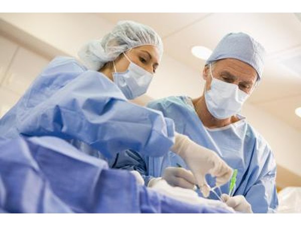 Doctors performing foot surgery