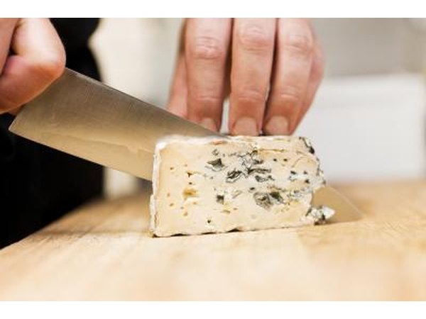 slicing blue cheese