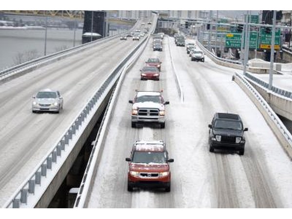 Commuters on snow-covered highway in Pittsburgh