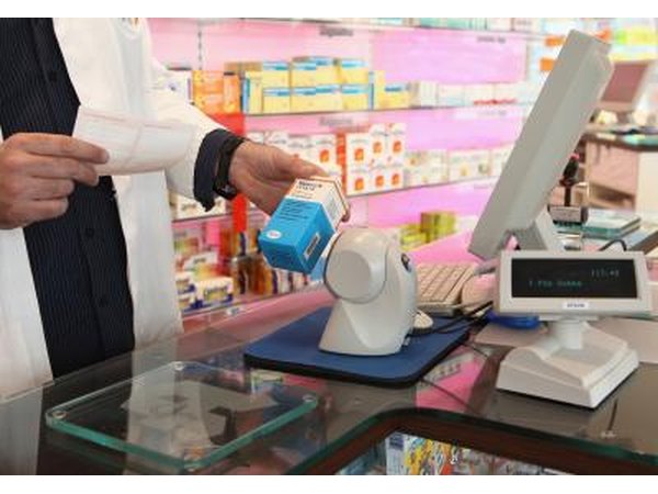 Pharmacist scans medication
