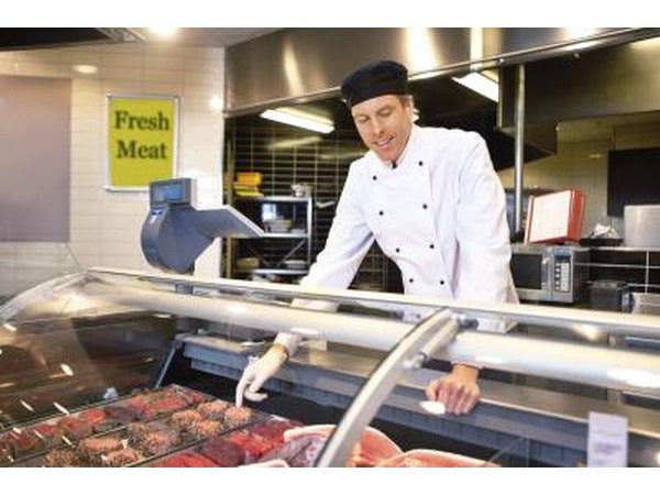 Deli worker multi tasking