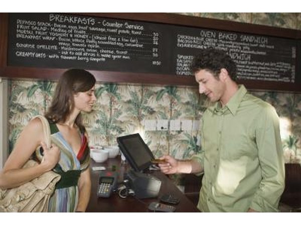 A hostess may help customers with their after-dinner tallies.