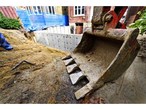 Backhoe in residential backyard
