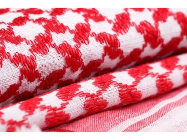 folded blankets with red and white