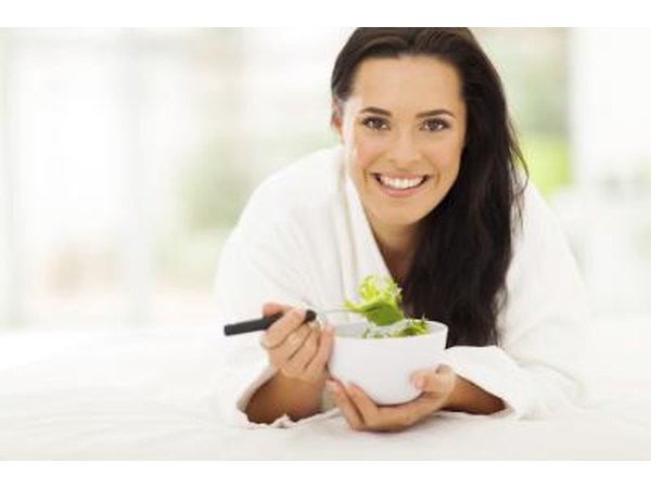 woman eating vegetables