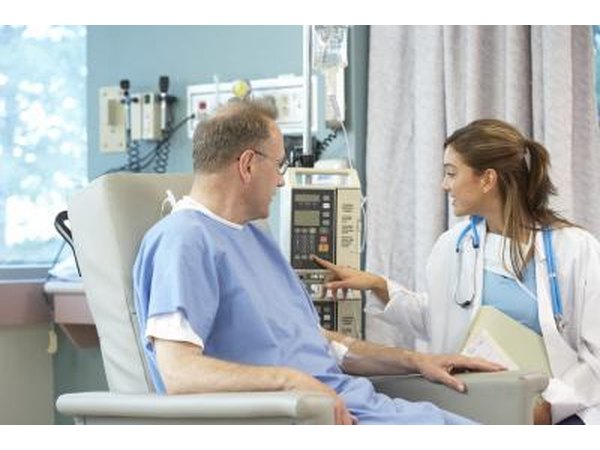 Pharmacy technicians mix fluids, chemotherapy and feeding solutions for intravenous use.