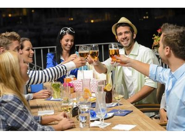 Group of friends celebrating at restaurant