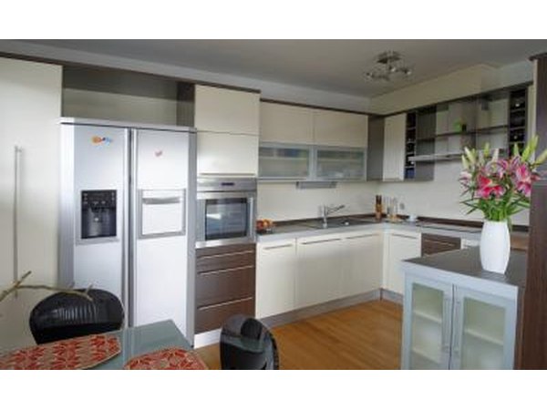 Cream colored kitchen on honey oak floors