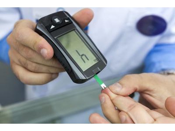 Diabetic takes a blood sugar level test