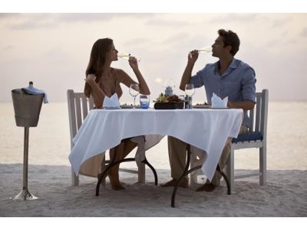 Couple having dinner on beach