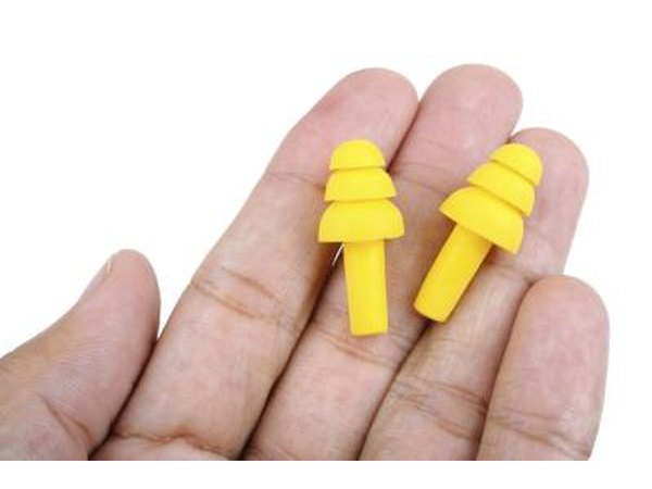 Remove earplugs slowly.