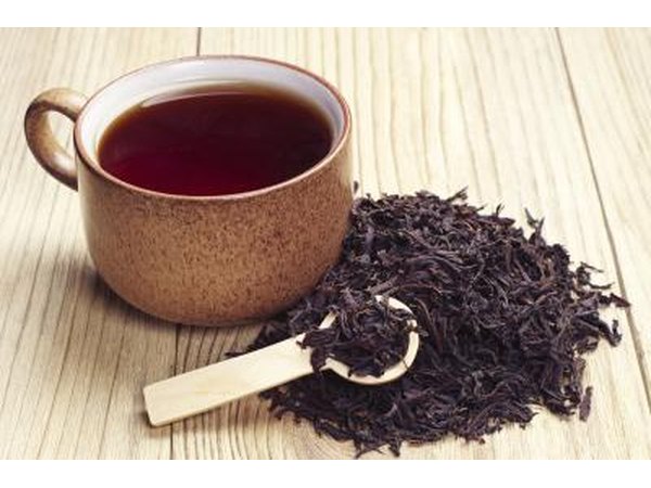 Use loose tea to add realistic specks along the edge of the paper.