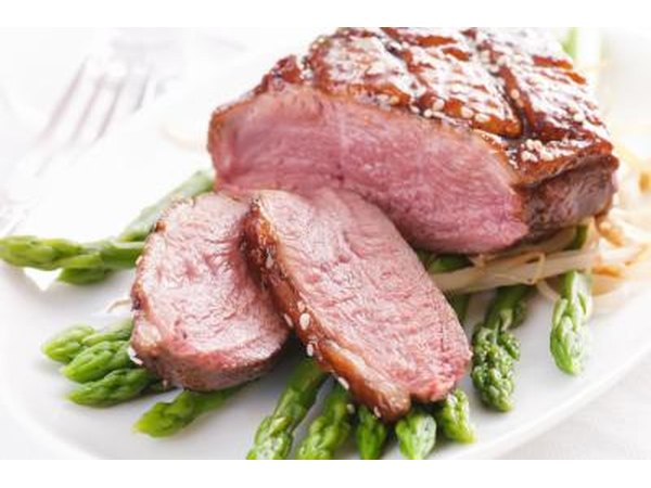 Duck breast on asparagus.