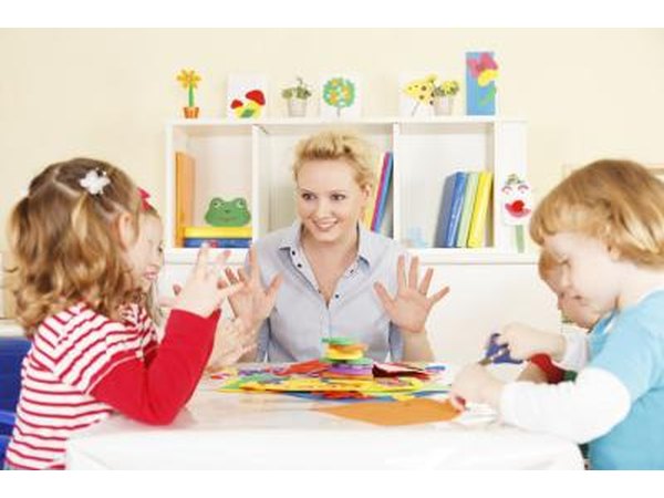 Kindergarten teacher with students