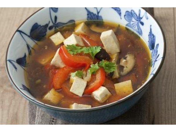 An asian style soup with tofu.