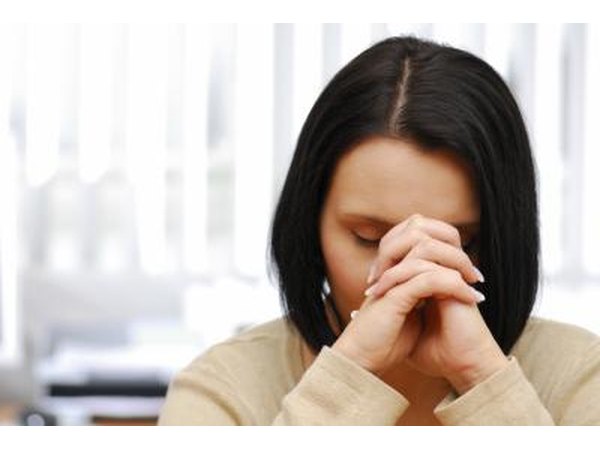 Young woman with a headache.